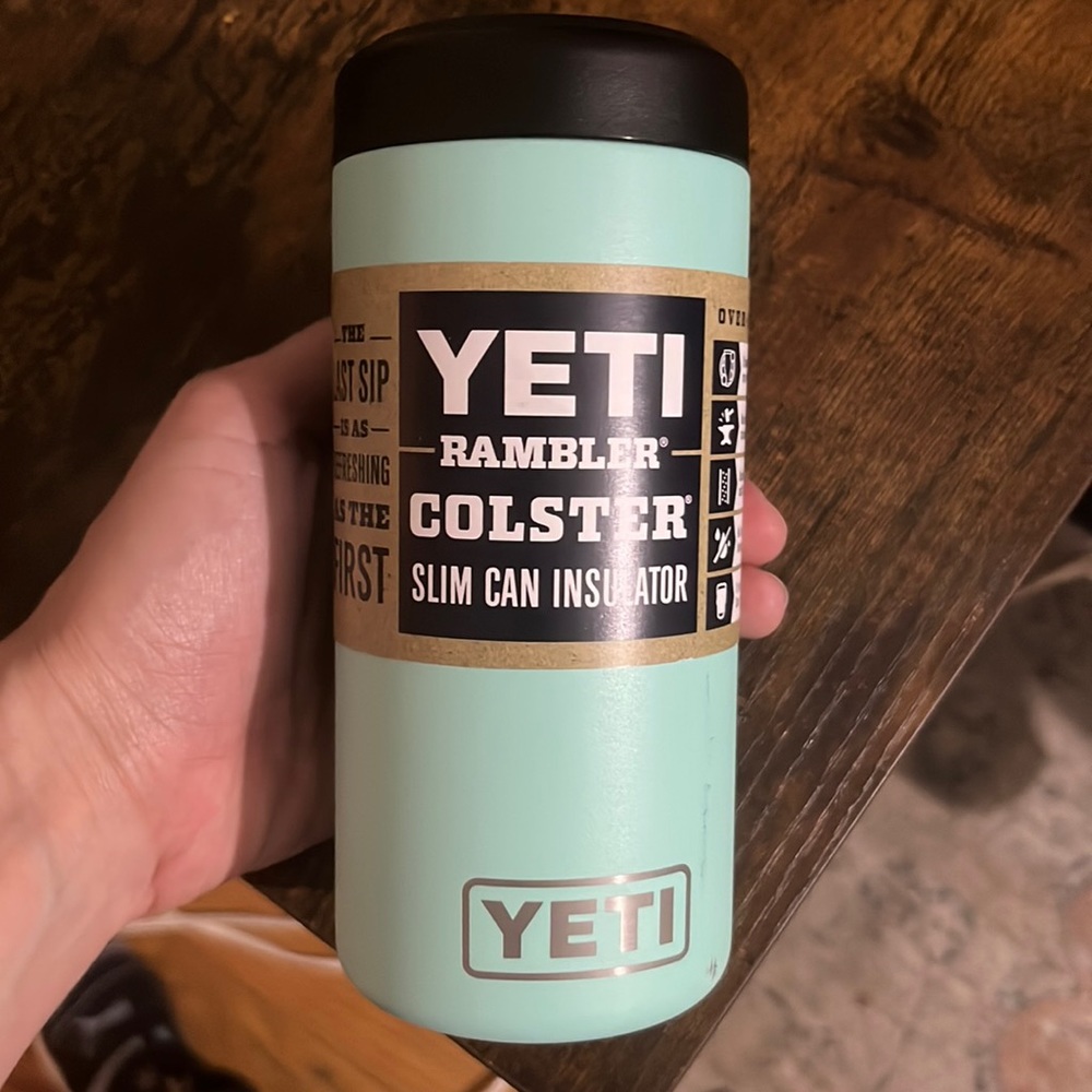 Yeti rambler slim can brand new never used with tag sleeve